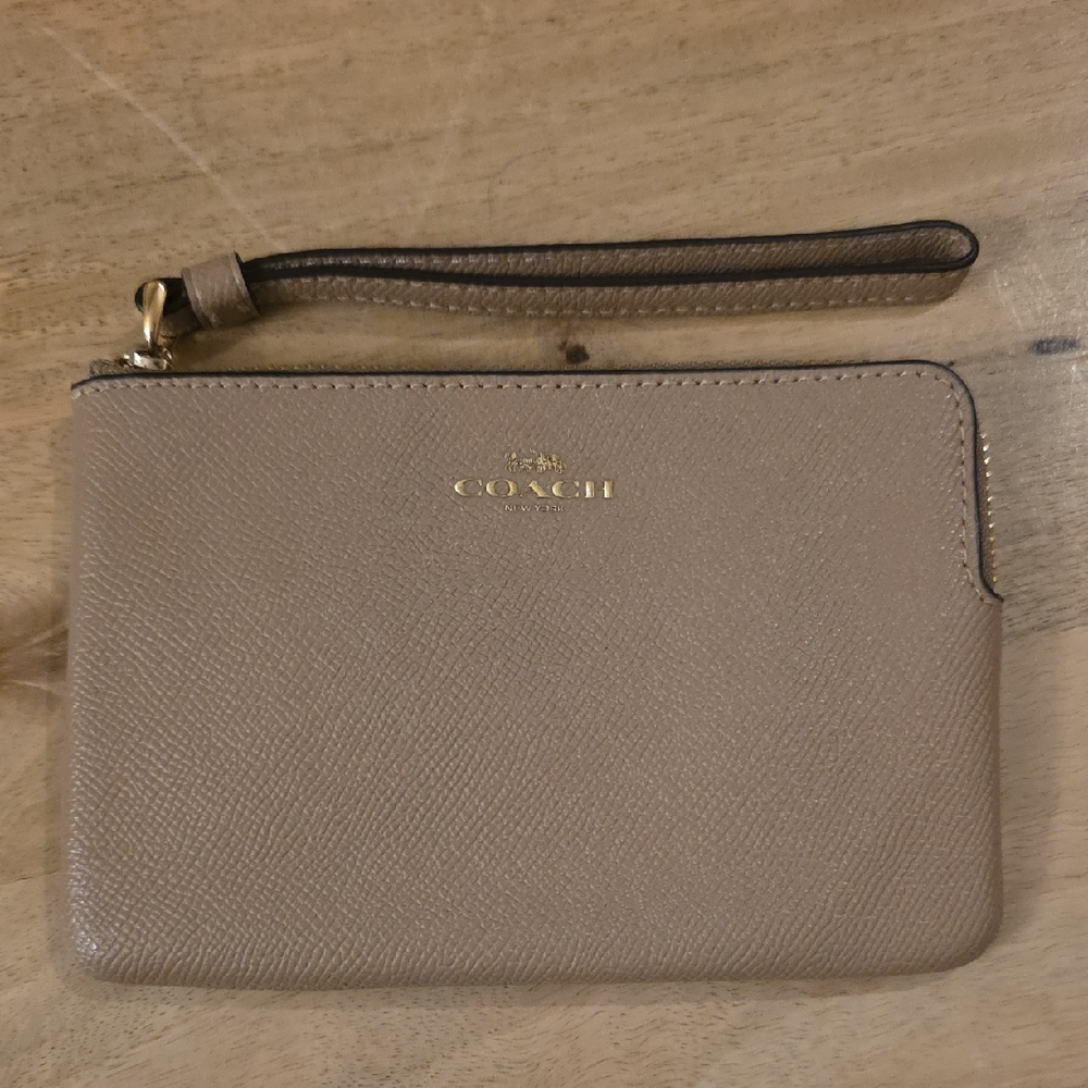 Coach Beige Wristlet with Gold Accents